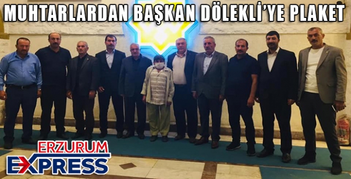 Başkan Dölekli’ye muhtarlardan plaket